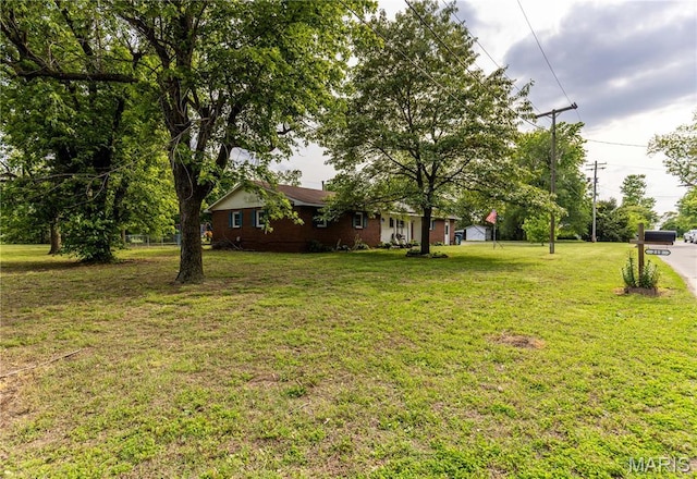 211 E Elm, Bertrand, MO 63823 - view of grassy yard