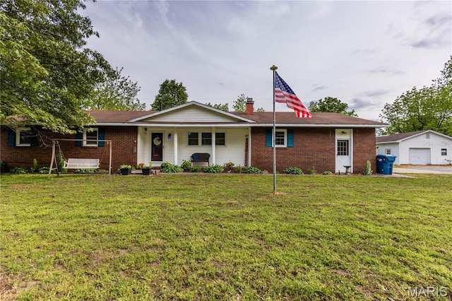 211 E Elm, Bertrand, MO 63823 - ranch-style house featuring brick siding, a detached garage, and a front lawn