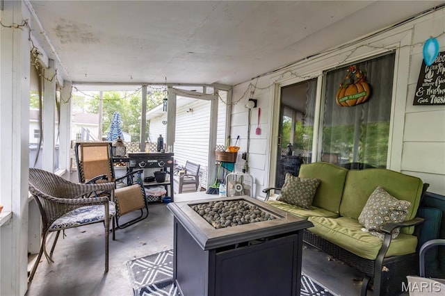 211 E Elm, Bertrand, MO 63823 - sunroom / solarium featuring an outdoor living space with a fire pit