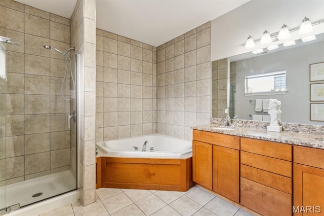4349 Washington Blvd, Saint Louis, MO 63108 - full bath featuring a stall shower, tile patterned flooring, a bath, and vanity