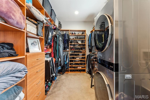 4349 Washington Blvd, Saint Louis, MO 63108 - spacious closet with stacked washer and clothes dryer and carpet