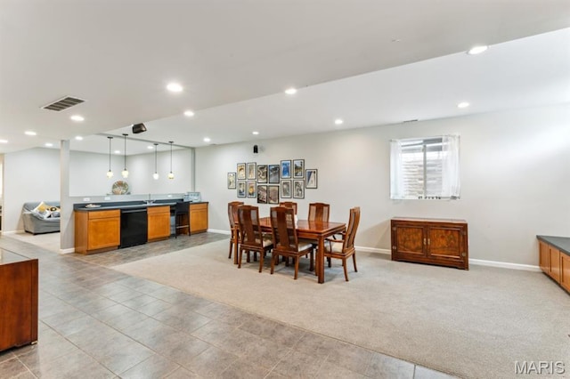 4349 Washington Blvd, Saint Louis, MO 63108 - dining space with baseboards, recessed lighting, and light carpet
