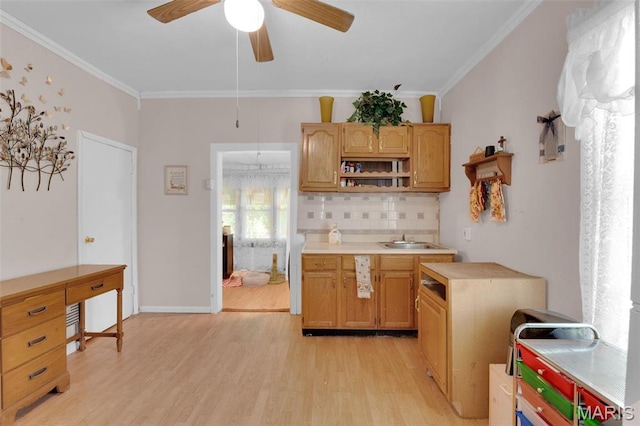 4229 Oakwood Ave, Saint Louis, MO 63121 - kitchen with light wood-style floors, decorative backsplash, ornamental molding, light countertops, and open shelves