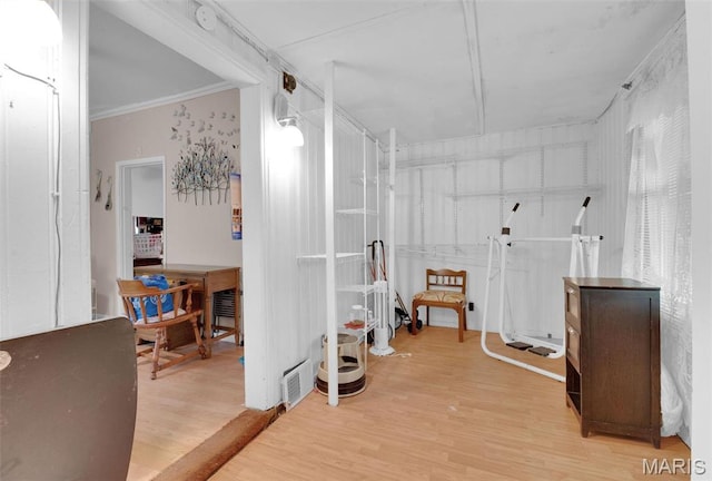 4229 Oakwood Ave, Saint Louis, MO 63121 - hall with light wood-style flooring and ornamental molding