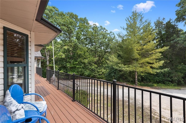 6703 Shenandoah Ln, Dittmer, MO 63023 - wooden deck featuring view of scattered trees