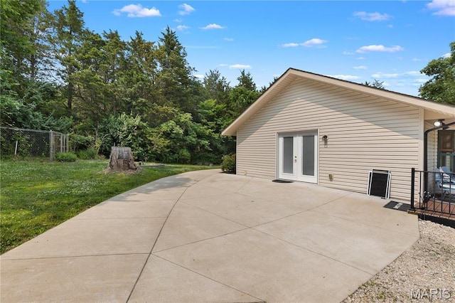 6703 Shenandoah Ln, Dittmer, MO 63023 - rear view of house featuring french doors and a patio area