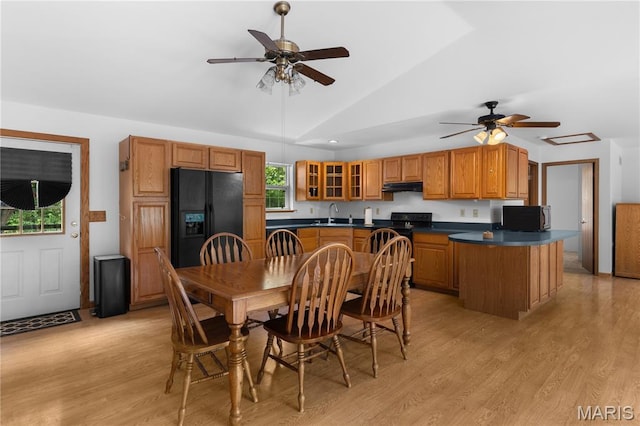 6703 Shenandoah Ln, Dittmer, MO 63023 - dining space with a ceiling fan, lofted ceiling, and light wood-style flooring