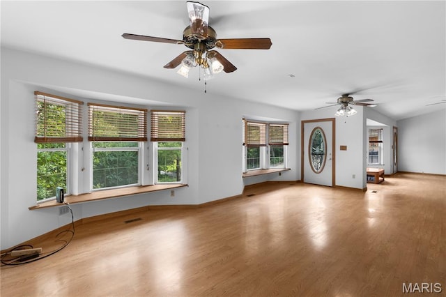 6703 Shenandoah Ln, Dittmer, MO 63023 - unfurnished living room with ceiling fan, wood finished floors, and baseboards