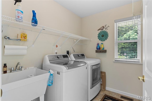 6703 Shenandoah Ln, Dittmer, MO 63023 - laundry area with washing machine and dryer and baseboards