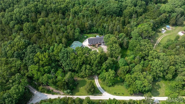 6703 Shenandoah Ln, Dittmer, MO 63023 - aerial view of property and surrounding area with a heavily wooded area