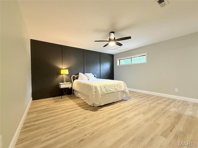 1307 Pike Dr, Bismarck, MO 63624 - bedroom featuring light wood finished floors, baseboards, and ceiling fan