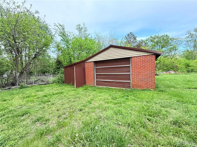 1307 Pike Dr, Bismarck, MO 63624 - view of pole building featuring a lawn