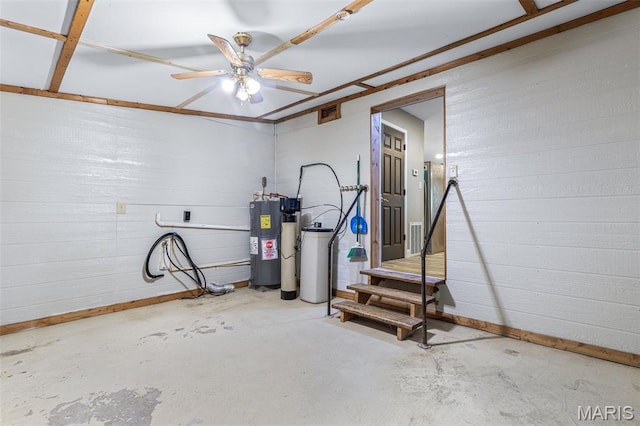 1307 Pike Dr, Bismarck, MO 63624 - below grade area featuring water heater, a water softener, a ceiling fan, and baseboards