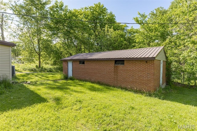 1307 Pike Dr, Bismarck, MO 63624 - view of grassy yard with an outbuilding