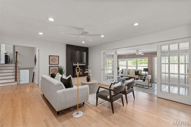 1 Woodoaks Trl, Saint Louis, MO 63124 - living room featuring ceiling fan, light wood-type flooring, recessed lighting, stairs, and french doors