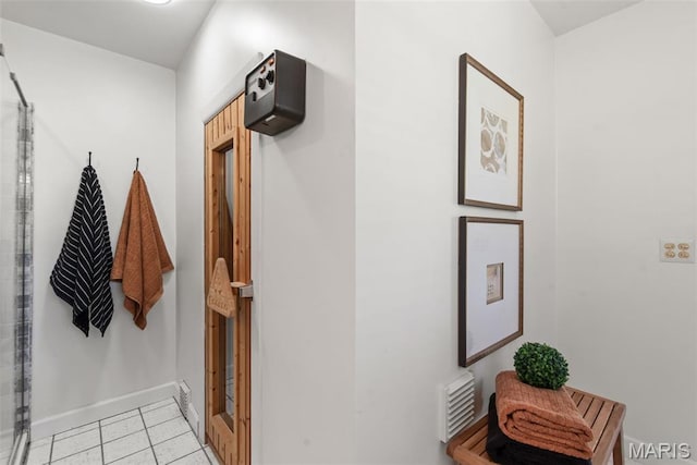 1 Woodoaks Trl, Saint Louis, MO 63124 - hall with light tile patterned flooring and baseboards