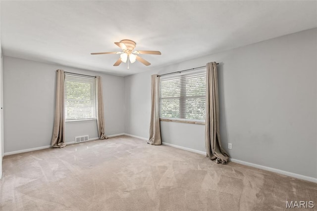1 Woodoaks Trl, Saint Louis, MO 63124 - spare room with ceiling fan, carpet flooring, and baseboards