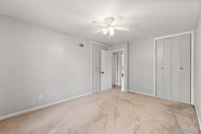 1 Woodoaks Trl, Saint Louis, MO 63124 - unfurnished bedroom with carpet, baseboards, ceiling fan, and a closet