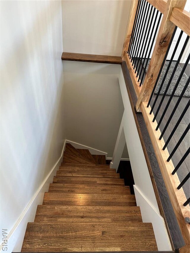 3985 Lakeshore Dr, New Haven, MO 63068 - stairway with wood finished floors and baseboards
