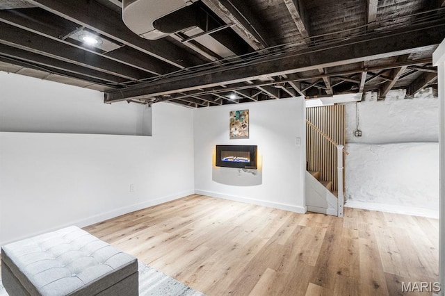 3641 Virginia Ave, Saint Louis, MO 63118 - finished basement with baseboards and wood finished floors