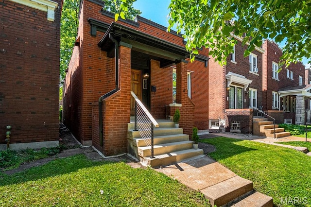 3641 Virginia Ave, Saint Louis, MO 63118 - view of front of property featuring brick siding and a front yard