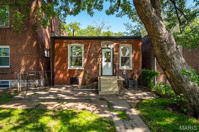 3641 Virginia Ave, Saint Louis, MO 63118 - view of property with brick siding and cooling unit