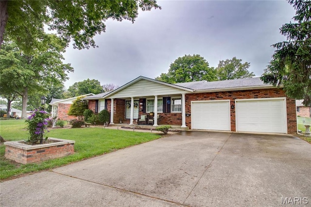 2332 Chadwick Dr, Alton, IL 62002 - ranch-style house featuring a garage, a porch, a front yard, brick siding, and concrete driveway