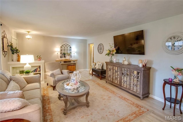 2332 Chadwick Dr, Alton, IL 62002 - living room featuring wood finished floors and baseboards