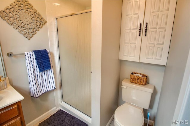 2332 Chadwick Dr, Alton, IL 62002 - full bath featuring a stall shower, toilet, vanity, and baseboards