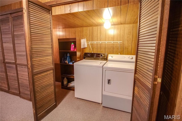 2332 Chadwick Dr, Alton, IL 62002 - laundry room featuring washer and clothes dryer, wood walls, light carpet, and wood ceiling