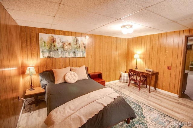 2332 Chadwick Dr, Alton, IL 62002 - bedroom with a drop ceiling, wood finished floors, wood walls, and baseboards