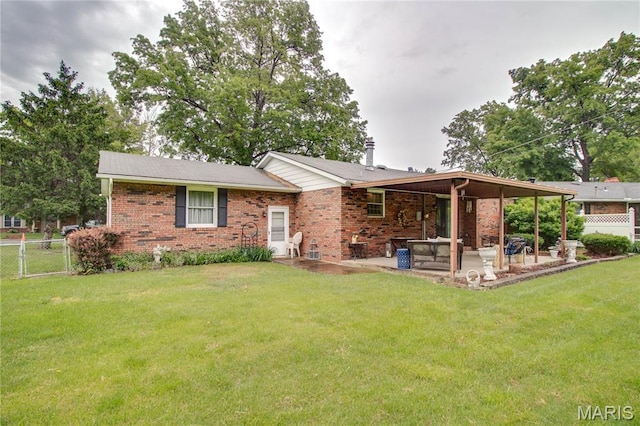 2332 Chadwick Dr, Alton, IL 62002 - rear view of property featuring a patio area and brick siding