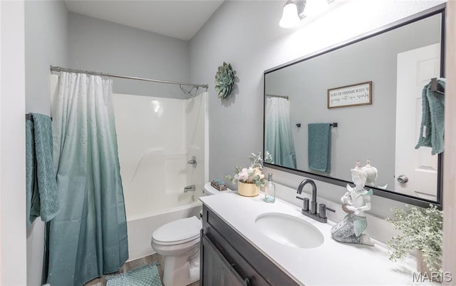 bathroom with vanity, toilet, and shower / bath combination with curtain
