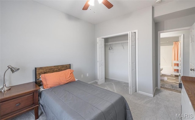 bedroom with carpet, a closet, ceiling fan, and baseboards