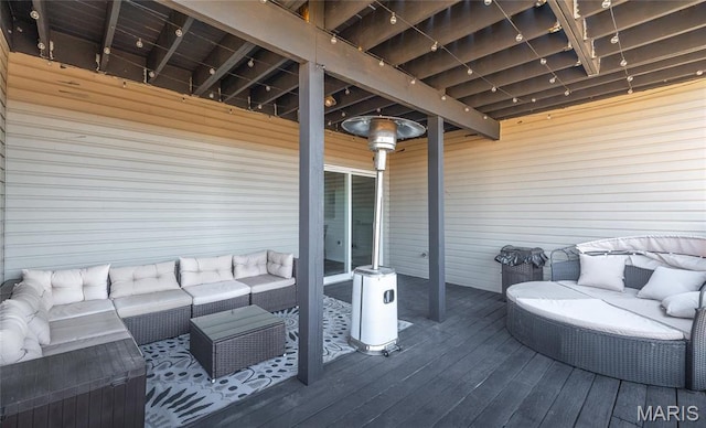 wooden deck featuring an outdoor hangout area