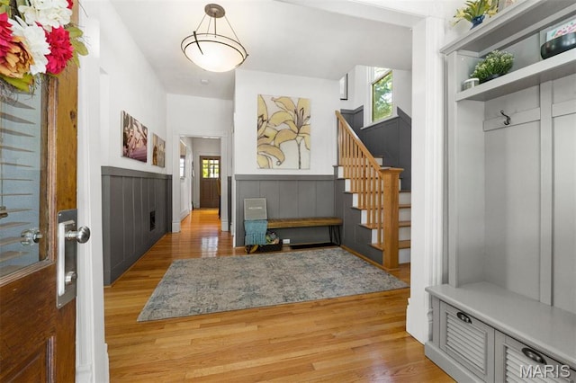 mudroom featuring plenty of natural light and wood finished floors