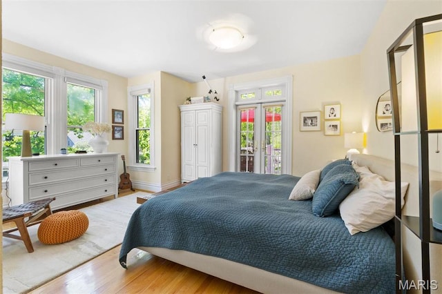 bedroom with wood finished floors