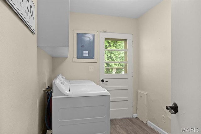 22 Briarwood Dr, Belleville, IL 62223 - laundry area featuring electric panel, wood finished floors, baseboards, and washer and dryer