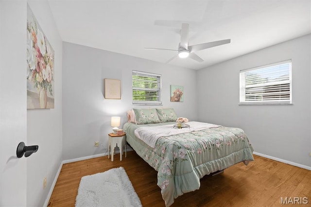 22 Briarwood Dr, Belleville, IL 62223 - bedroom featuring baseboards, wood finished floors, and a ceiling fan
