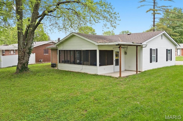 22 Briarwood Dr, Belleville, IL 62223 - rear view of house with a sunroom, roof with shingles, and a patio area