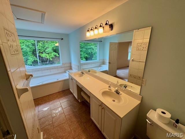 650 Legends View Dr, Eureka, MO 63025 - bathroom featuring a bath, toilet, double vanity, and tile patterned floors