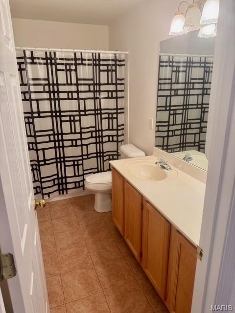 650 Legends View Dr, Eureka, MO 63025 - bathroom featuring tile patterned flooring, toilet, and vanity