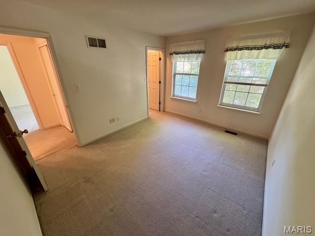 650 Legends View Dr, Eureka, MO 63025 - unfurnished room with light colored carpet and baseboards