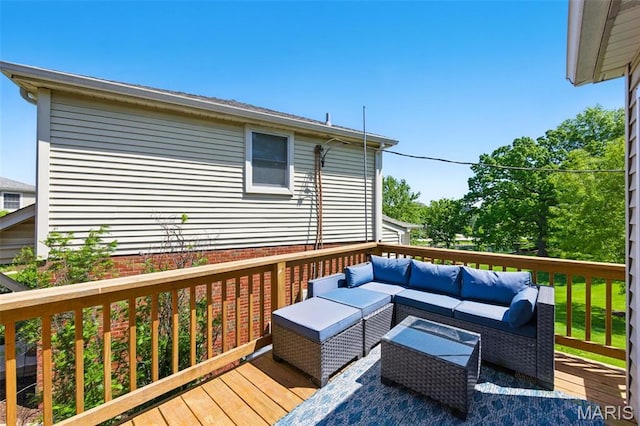 wooden deck featuring outdoor lounge area