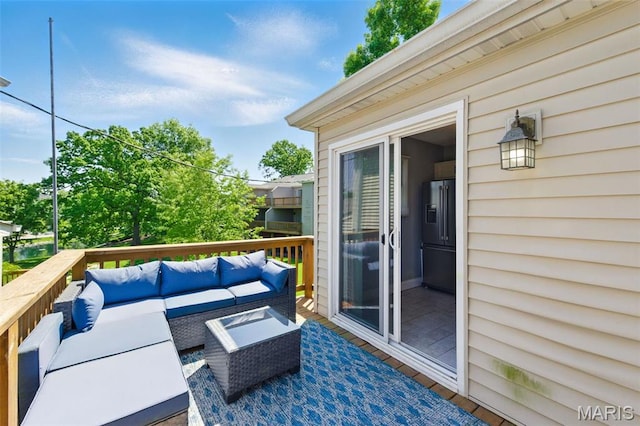 wooden deck featuring an outdoor living space