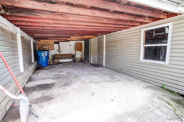 view of patio featuring a carport