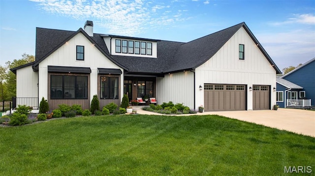 10028 Pineridge Dr, Effingham, IL 62401 - modern inspired farmhouse featuring roof with shingles, a chimney, and a front yard