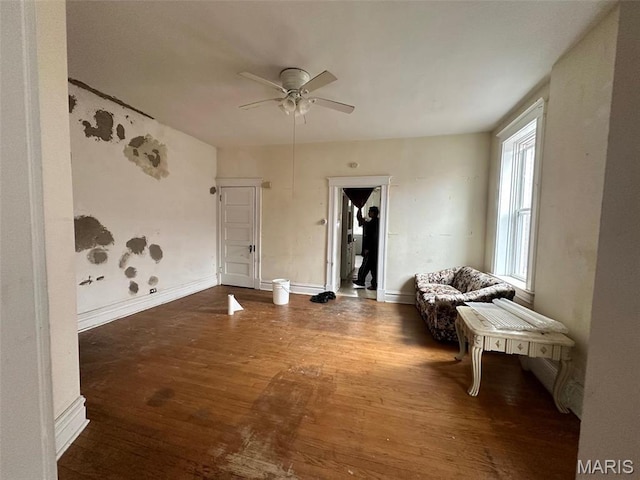 3636 Arkansas Ave, Saint Louis, MO 63118 - living area with ceiling fan, wood finished floors, and baseboards
