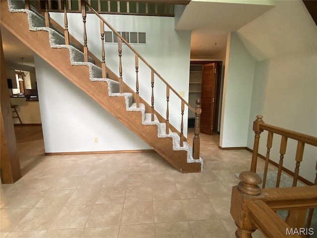 236 Mohawk Dr, Cape Girardeau, MO 63701 - stairs featuring baseboards and tile patterned flooring
