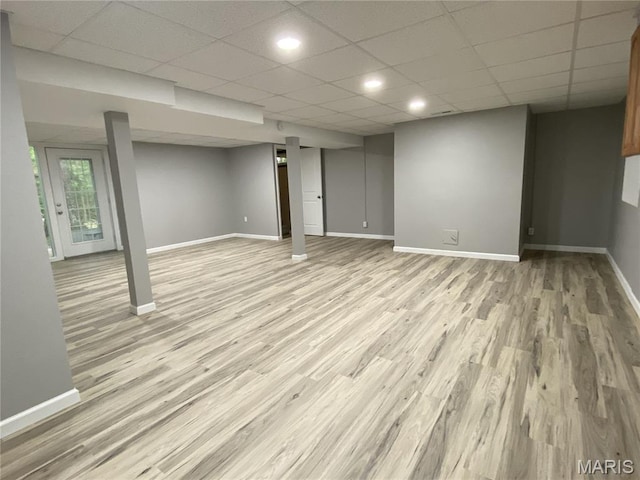 236 Mohawk Dr, Cape Girardeau, MO 63701 - basement with light wood finished floors, baseboards, a drop ceiling, and recessed lighting